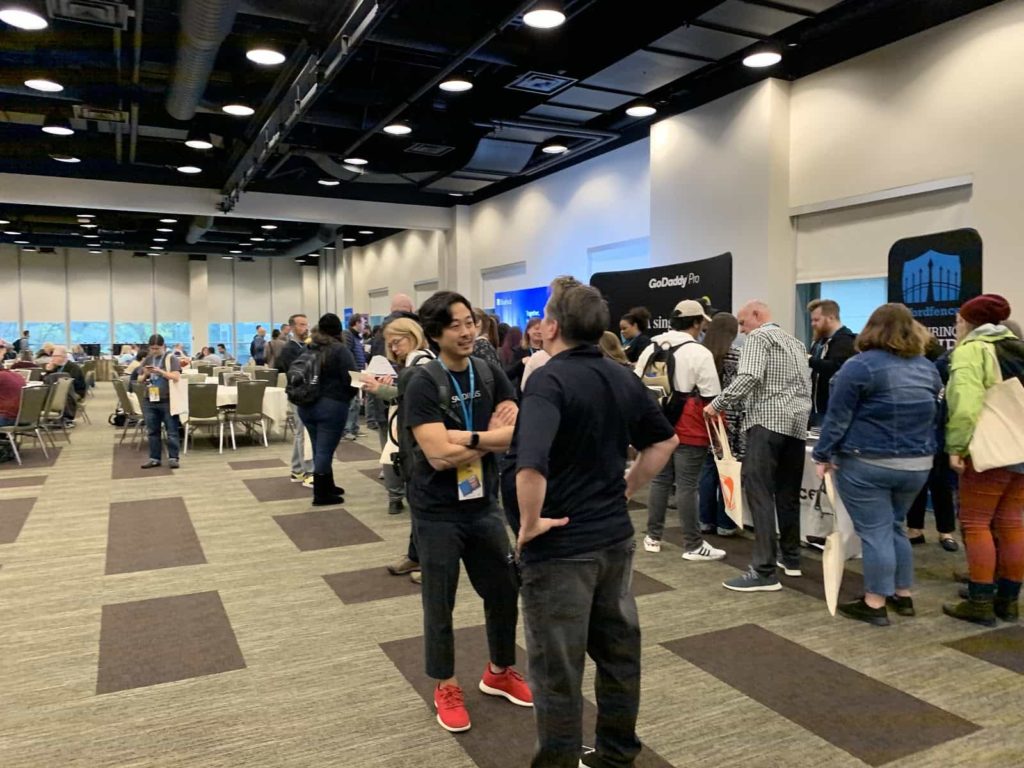 Chatting with sponsors at WordCamp Seattle 2019.